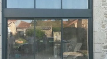 Remplacement Porte de grange par Baie coulissante Bicon